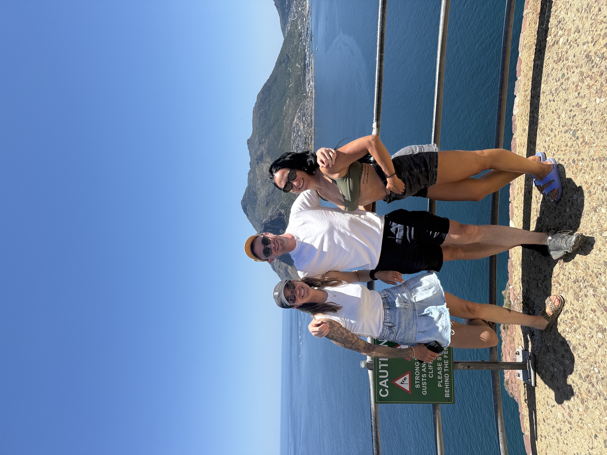 Local Secrets XP expedition group at Cape Town scenic lookout with ocean and mountain views — South Africa kite trip
