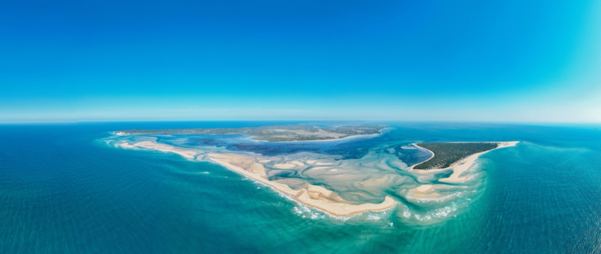 Aerial panorama of Inhaca Island sandbanks and turquoise Indian Ocean channels — Mozambique kite expedition