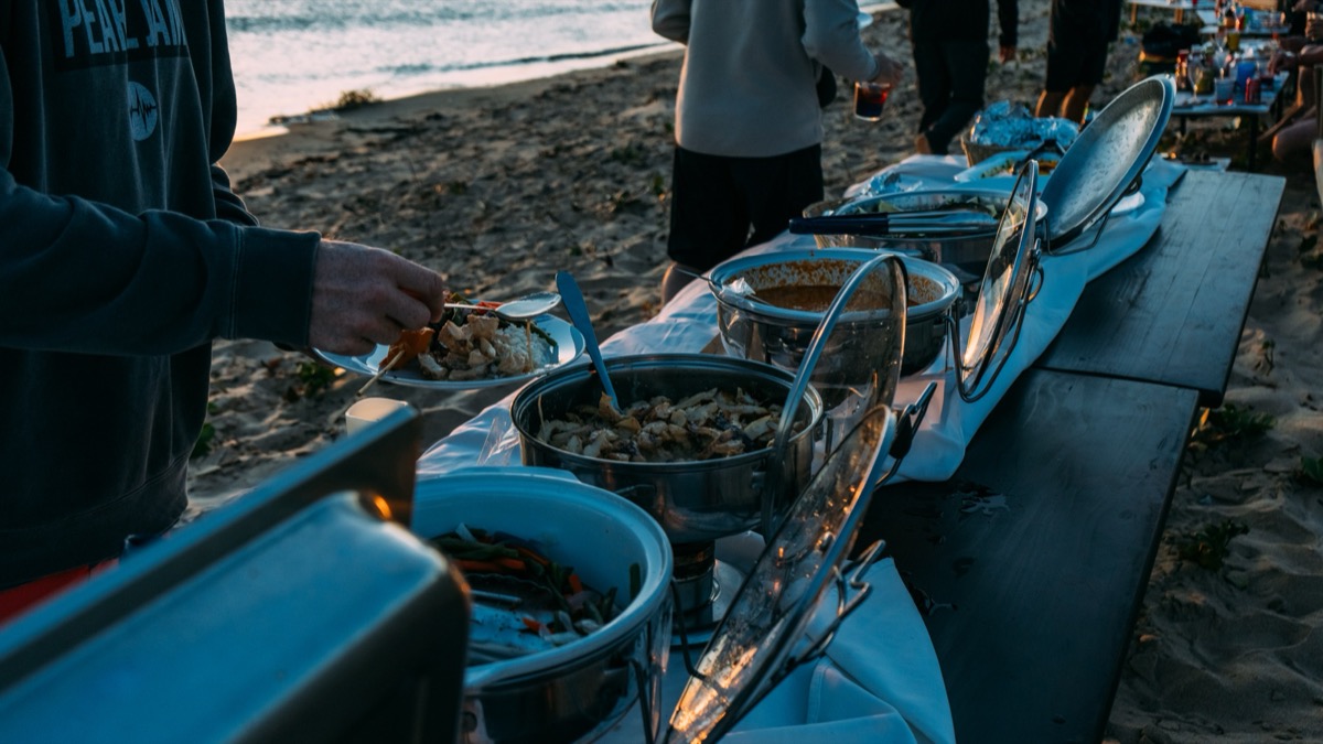 All-inclusive beach dinner buffet at sunset on Inhaca Island — Local Secrets XP Mozambique expedition