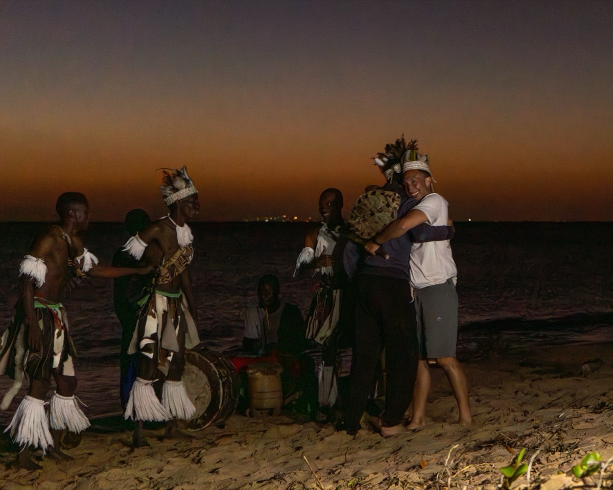 Traditional Mozambican cultural dancers performing on Inhaca Island beach at night